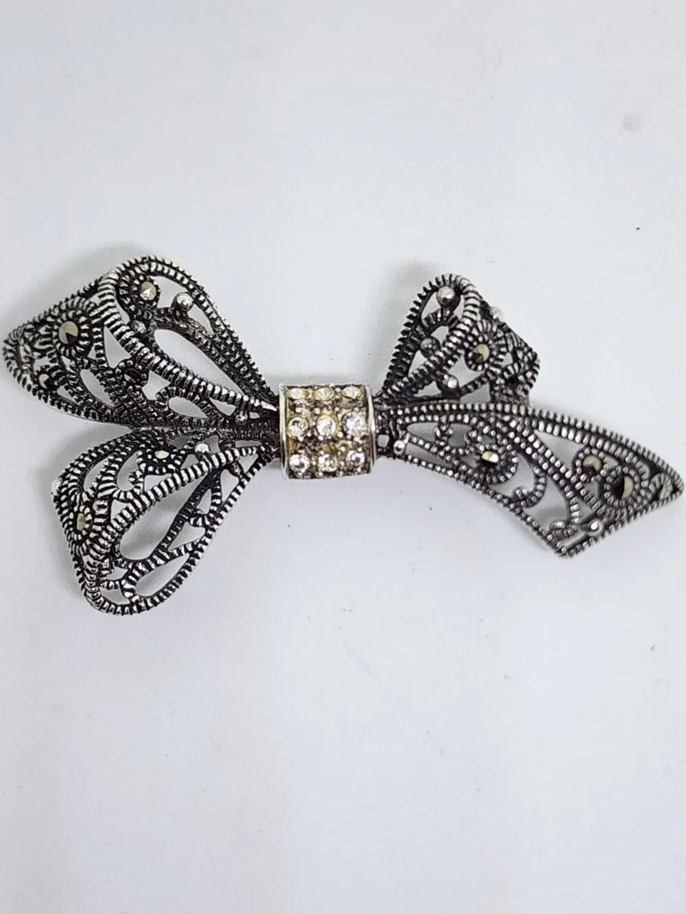 Vintage Sterling Silver Rhinestone and Marcasite Accent Bow Pin Brooch